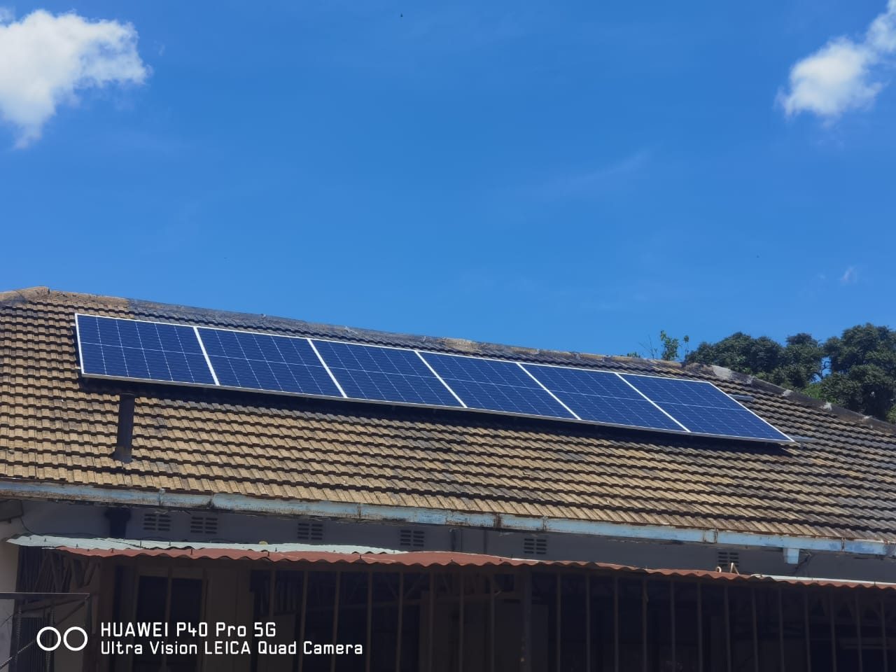 Solar panels installed on a tiled roof